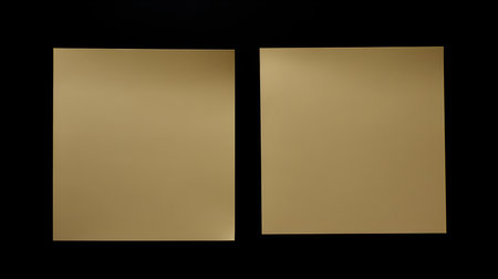 Two Khaki square paper notes on a black background. Brainstorming template with copy spaceの素材