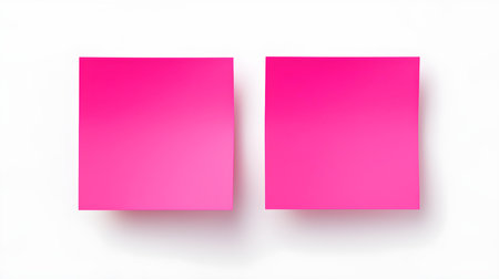Two hot pink square paper notes on a white background. Brainstorming template with copy spaceの素材