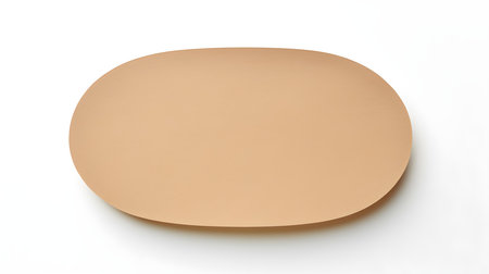 Light brown oval paper note on a white background. Brainstorming template with copy spaceの素材