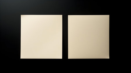 Two ivory square paper notes on a black background. Brainstorming template with copy spaceの素材