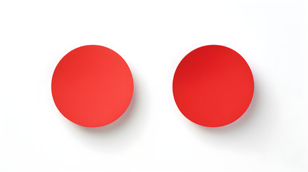 Two light red round paper notes on a white background. Brainstorming template with copy spaceの素材