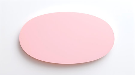 Light Pink oval Paper Note on a white background. Brainstorming template with copy spaceの素材