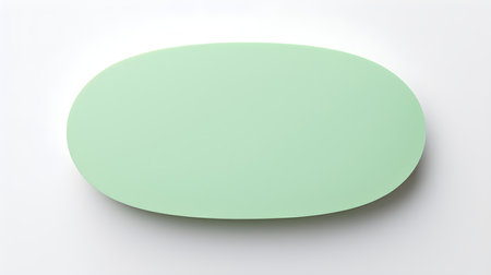 Light Green oval Paper Note on a white background. Brainstorming template with copy spaceの素材