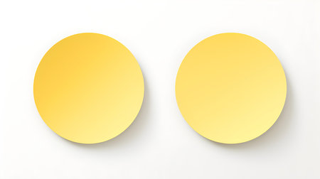 Two Light Yellow round Paper Notes on a white background. Brainstorming template with copy spaceの素材