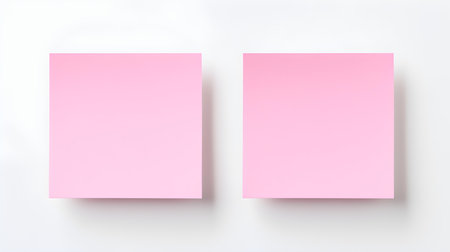 Two light pink square paper notes on a white background. Brainstorming template with copy spaceの素材