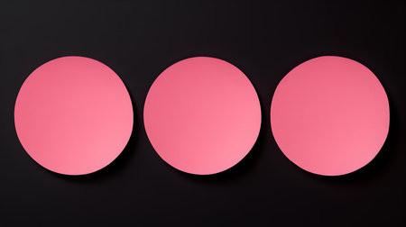 Set of pink round paper notes on a black background. Brainstorming template with copy spaceの素材