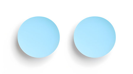 Two Sky Blue round Paper Notes on a white background. Brainstorming template with copy spaceの素材