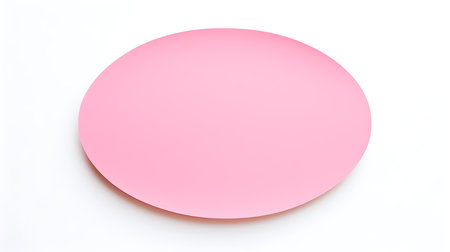 Pink oval paper note on a white background. Brainstorming template with copy spaceの素材