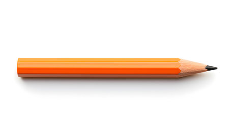 Orange pencil on a white background. Education template with copy spaceの素材
