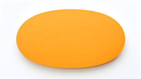 Orange oval paper note on a white background. Brainstorming template with copy spaceの素材