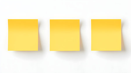 Set of light yellow square paper notes on a white background. Brainstorming template with copy spaceの素材