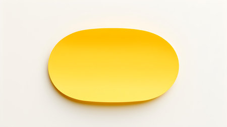 Yellow oval paper note on a white background. Brainstorming template with copy spaceの素材