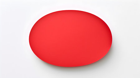 Red oval paper note on a white background. Brainstorming template with copy spaceの素材