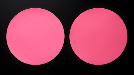 Two pink round paper notes on a black background. Brainstorming template with copy spaceの素材