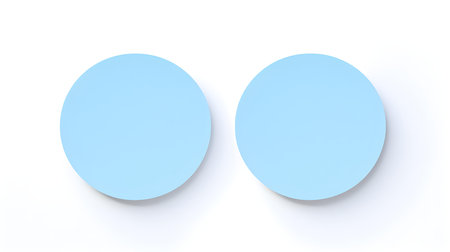 Two Sky Blue round Paper Notes on a white background. Brainstorming template with copy spaceの素材