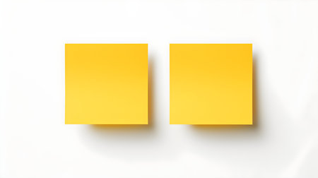 Two yellow square paper notes on a white background. Brainstorming template with copy spaceの素材
