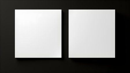 Two white square paper notes on a black background. Brainstorming template with copy spaceの素材