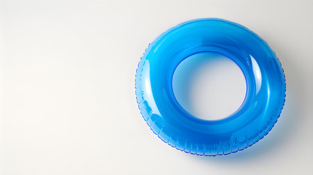Blue inflatable ring on a white background with copy spaceの素材