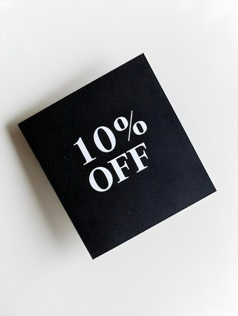 White '10% OFF' Text on an Anthracite Square Paper Note. White Backgroundの素材