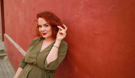 Young smiling redhead womanの写真素材