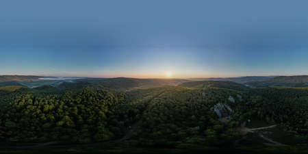 Aerial view of Ukrainian mountain range. Beautiful summer scenery. Morning mountain valley....
