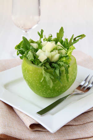 arugula salad served in an appleの写真素材