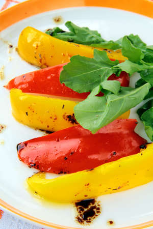 grilled bell peppers paprika on a plateの写真素材