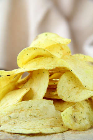 pile of ruffled potato chips の写真素材