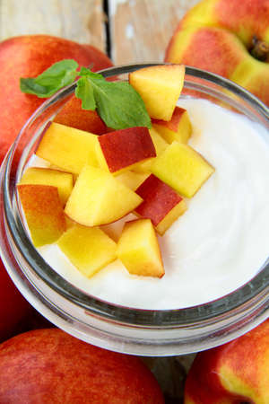 fresh natural yogurt with berries in a glass jarの写真素材