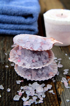 Spa still life .Bath lilac salt, towel and  candle