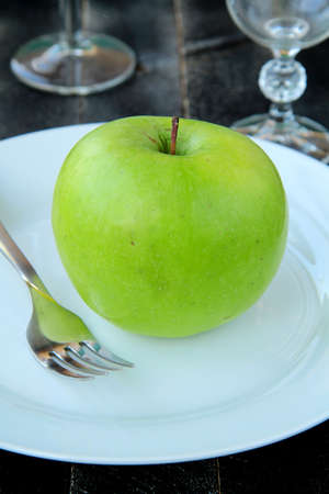 Stylish tableware, fresh appleの写真素材