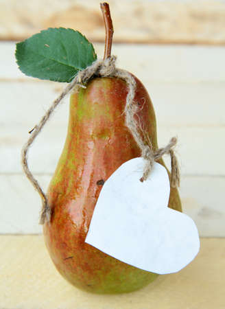 fresh organic green pear on the natural backgroundの写真素材