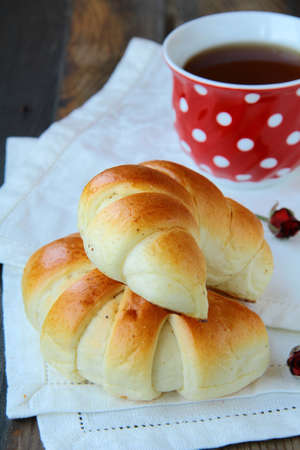 Breakfast with coffee and croissants 