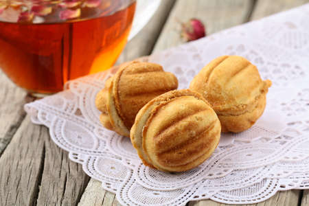 homemade biscuits cookies on a wooden table, rustic style