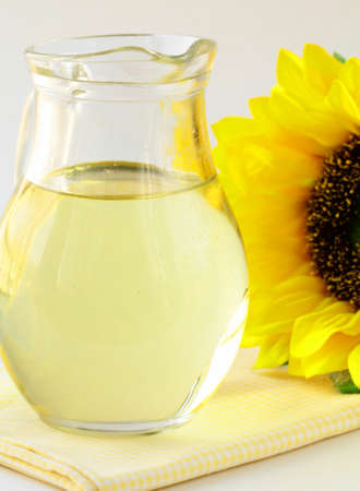 sunflower oil from sunflower in a glass jarの写真素材