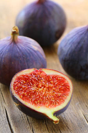 sweet fruit ripe figs on a wooden board
