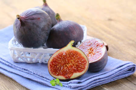 sweet fruit ripe figs on a wooden board