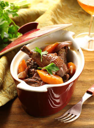 Traditional French cuisine - chicken in wine, coq au vin Traditional French cuisine - chicken in wine, coq au vin