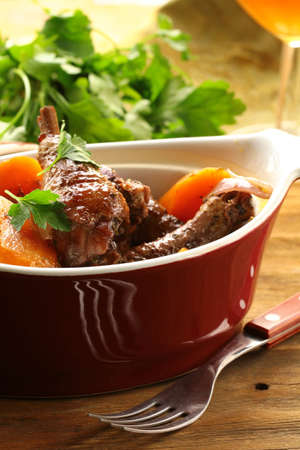Traditional French cuisine - chicken in wine, coq au vin Traditional French cuisine - chicken in wine, coq au vin