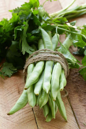 green peas on a wooden table, rustic style