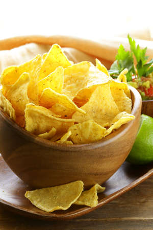 corn tortilla chips in a wooden bowl