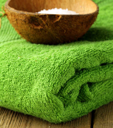 sea salt and towel - green spa conceptの写真素材