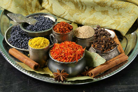 collection of various spices  paprika, turmeric, pepper, aniseed, cinnamon, saffron の写真素材