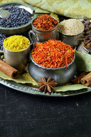 collection of various spices  paprika, turmeric, pepper, aniseed, cinnamon, saffron の写真素材