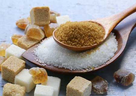 Various kinds of sugar, brown, white and refined sugarの写真素材