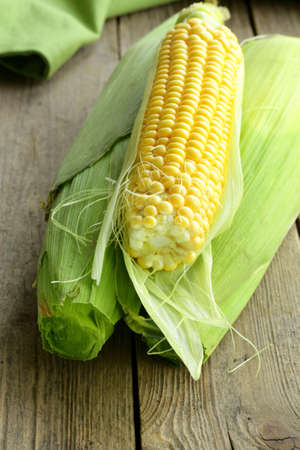 fresh organic corn on the wooden table