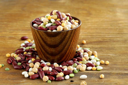 Assortment of different types of beans - red beans, chickpeas, peasの写真素材