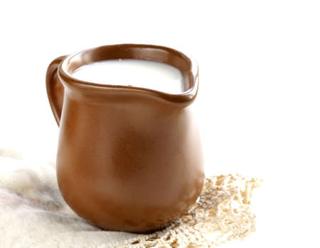 ceramic brown  jug full of milk, rustic styleの写真素材