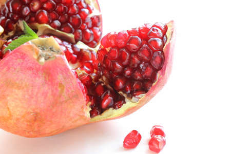 red juicy ripe organic pomegranate fruit の写真素材