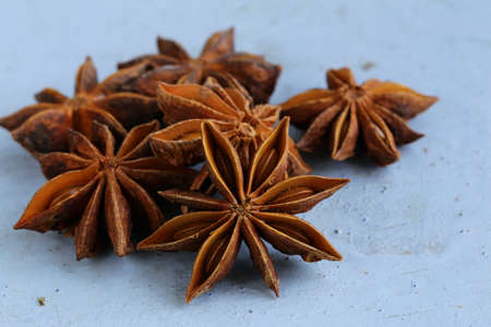 spice star anise  badjan  on wooden backgroundの写真素材